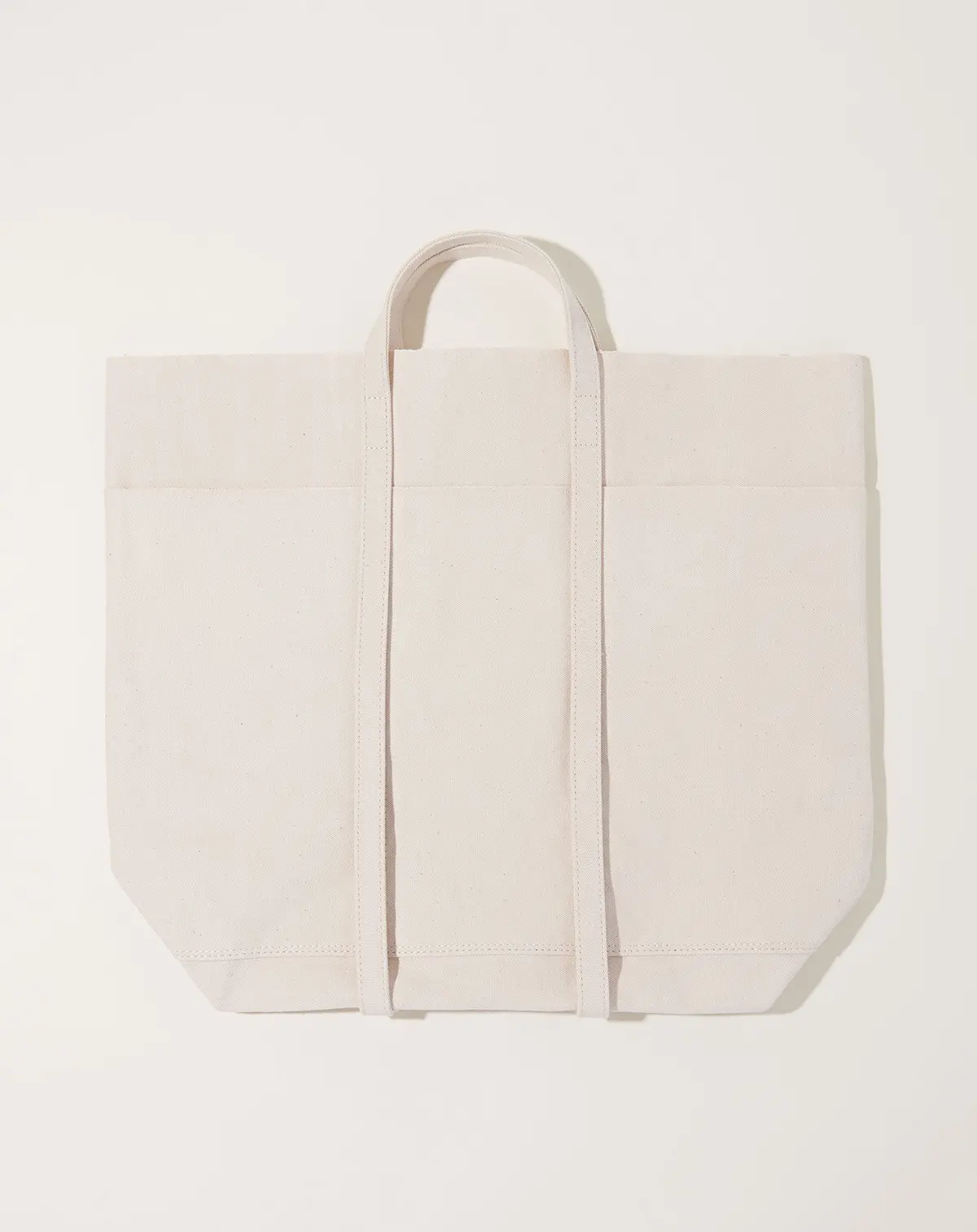 Washed Canvas 6 Pocket Tall Tote In White 1