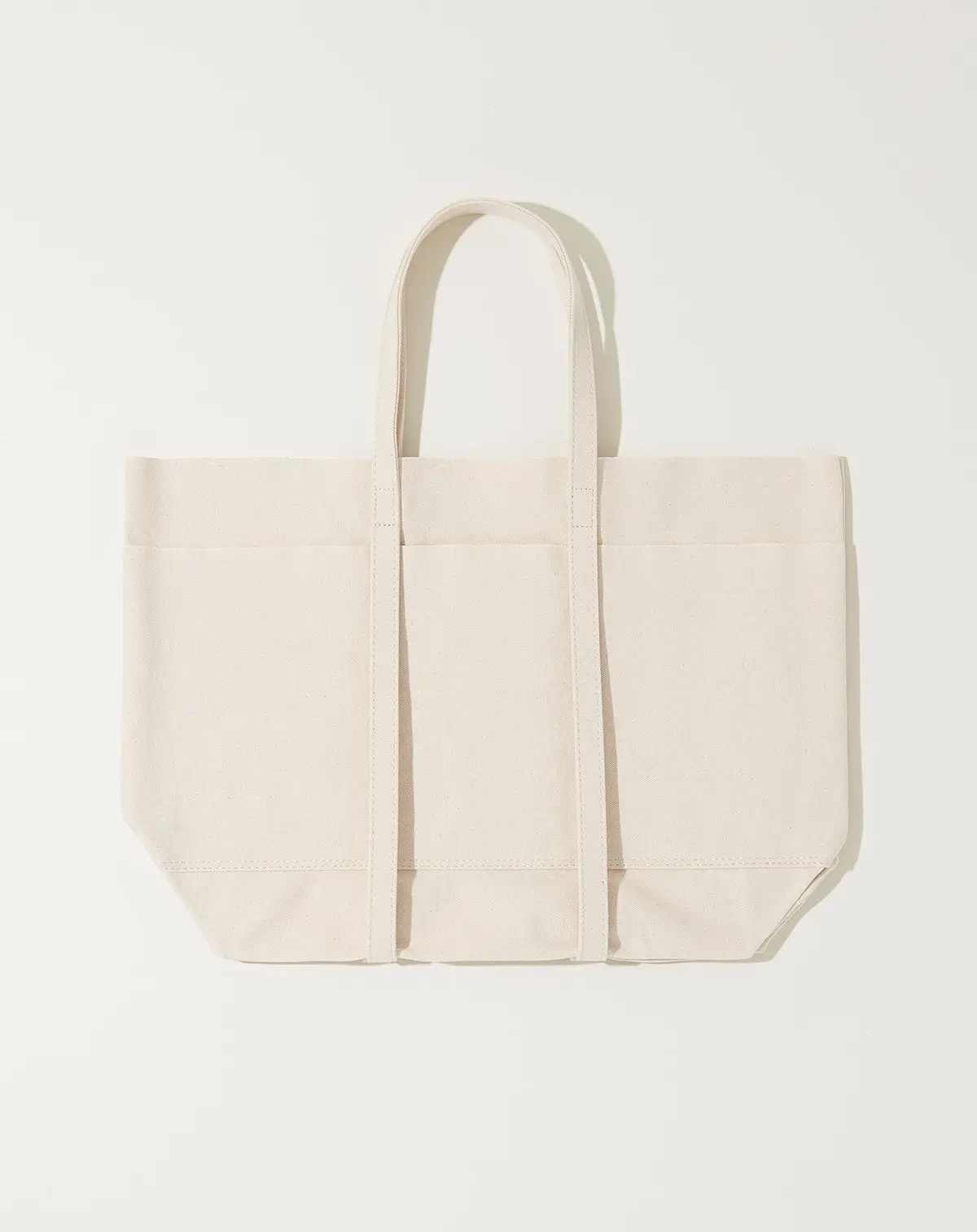 Washed Canvas 6 Pocket Tote In White 1