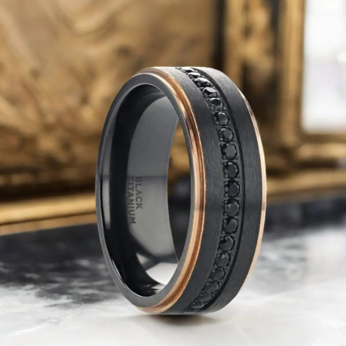 Astro | Black Titanium Ring, Sapphire Stones, Rose Gold Stepped Edges 1