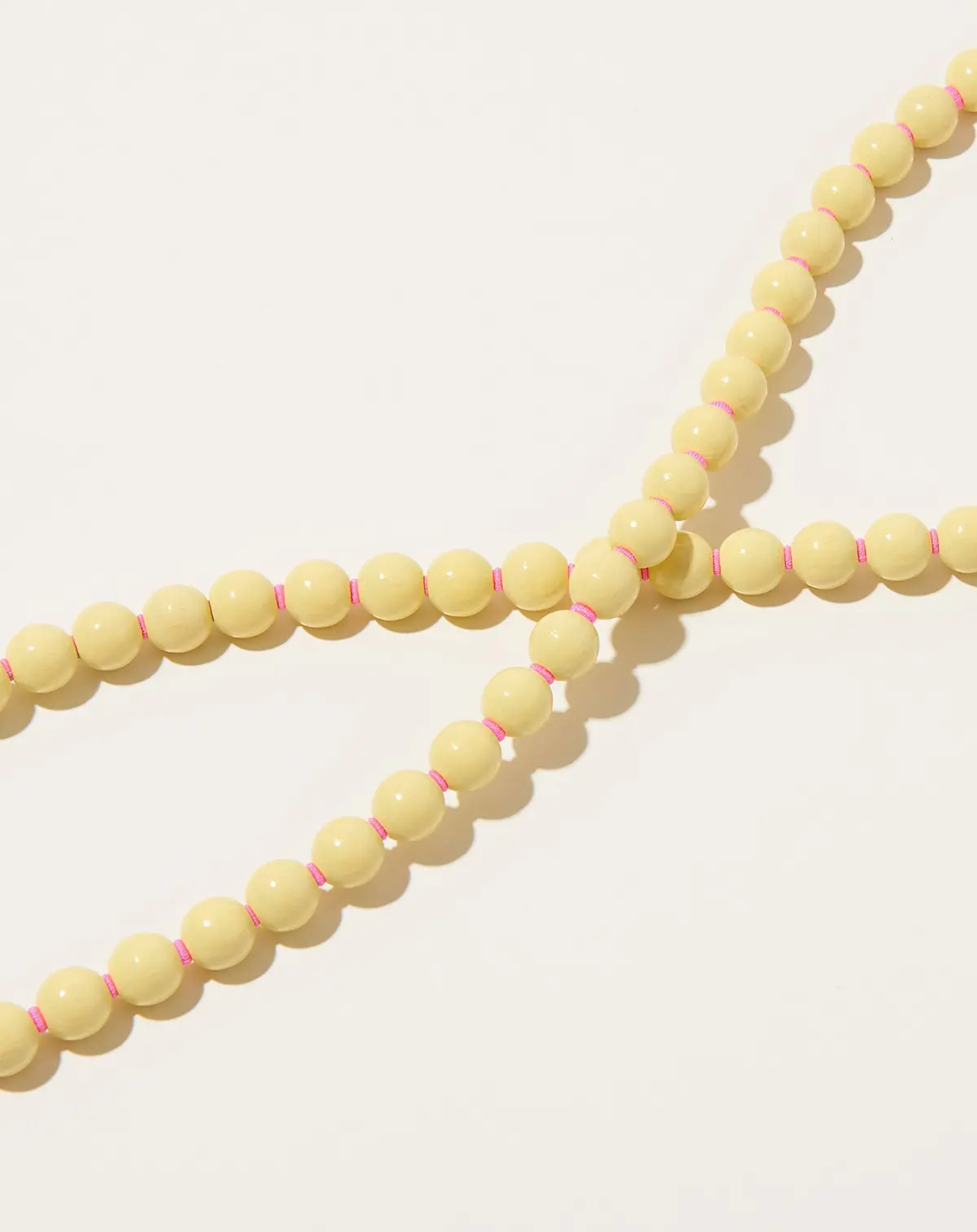 Handykette Iphone Necklace In Pastel Yellow On Pink 3