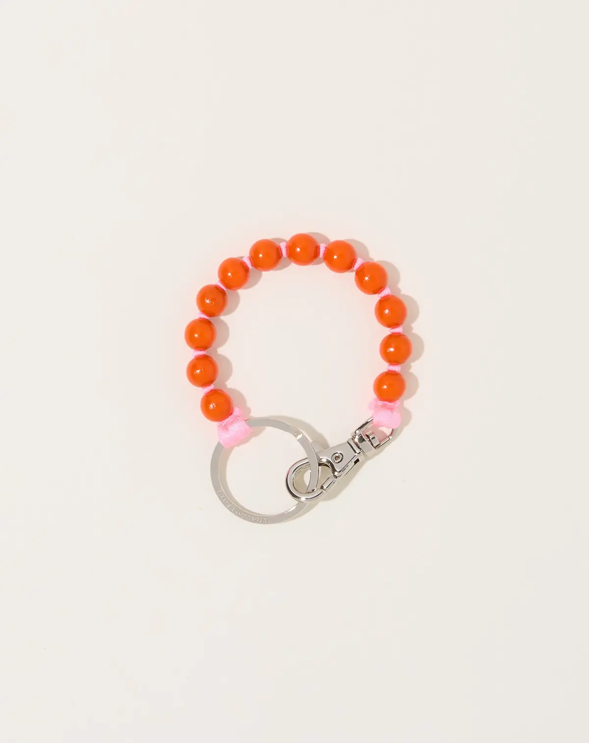Perlen Short Keyholder In Orange On Rose 1